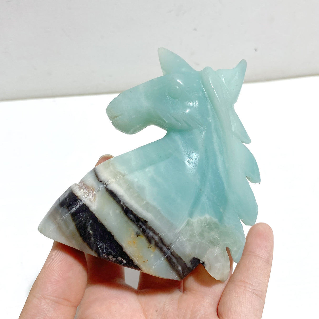 11 Pieces Caribbean Calcite Unicorn Carving Closeout