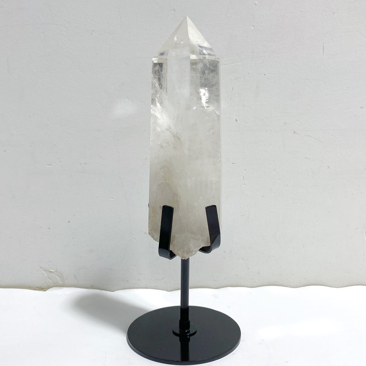 Large Clear Quartz Point Raw Bottom With Stand