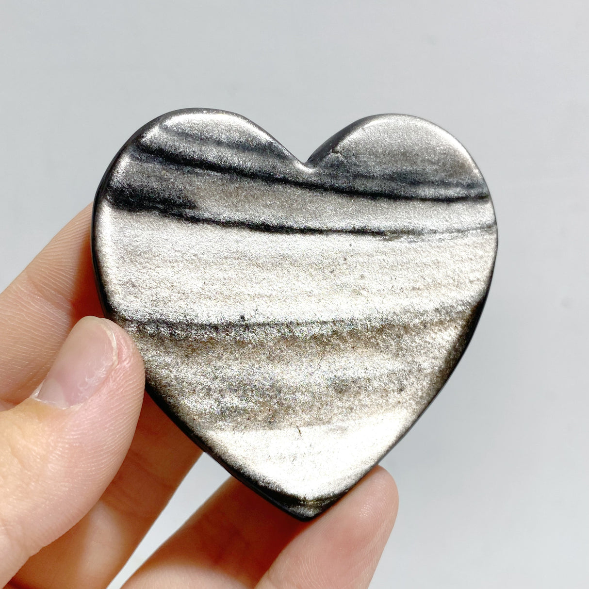 Silver Sheen Obsidian Heart Wing Carving With Stand