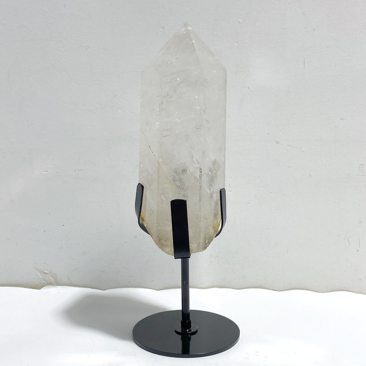 Large Clear Quartz Point Raw Bottom With Stand