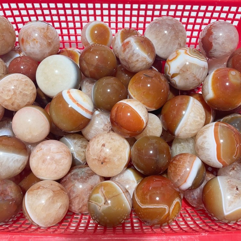 1.5 - 2.7in Carnelian Mixed Quartz Stripe Spheres Wholesale - Wholesale Crystals