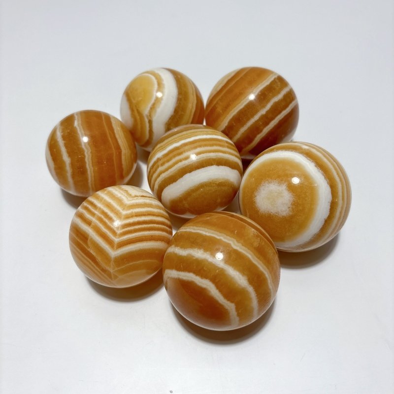 1.9 - 2.5inch Yellow Calcite Stripe Spheres Wholesale - Wholesale Crystals