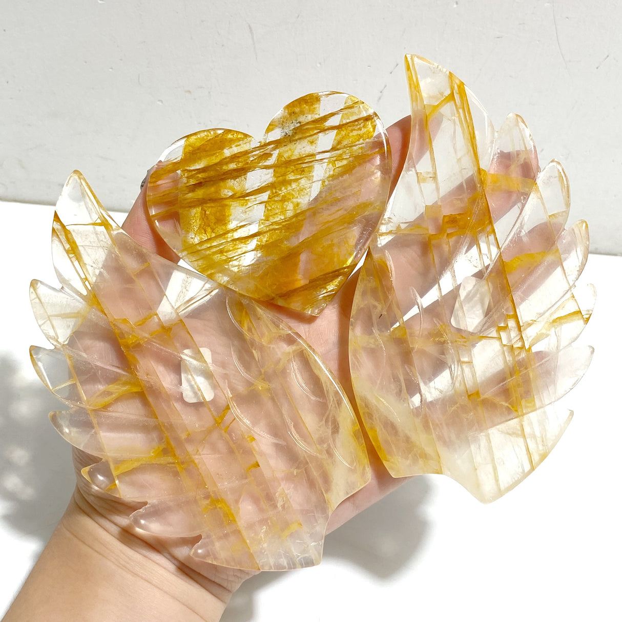 Golden Hematoid Quartz Fire Quartz Heart Wing Carving With Stand