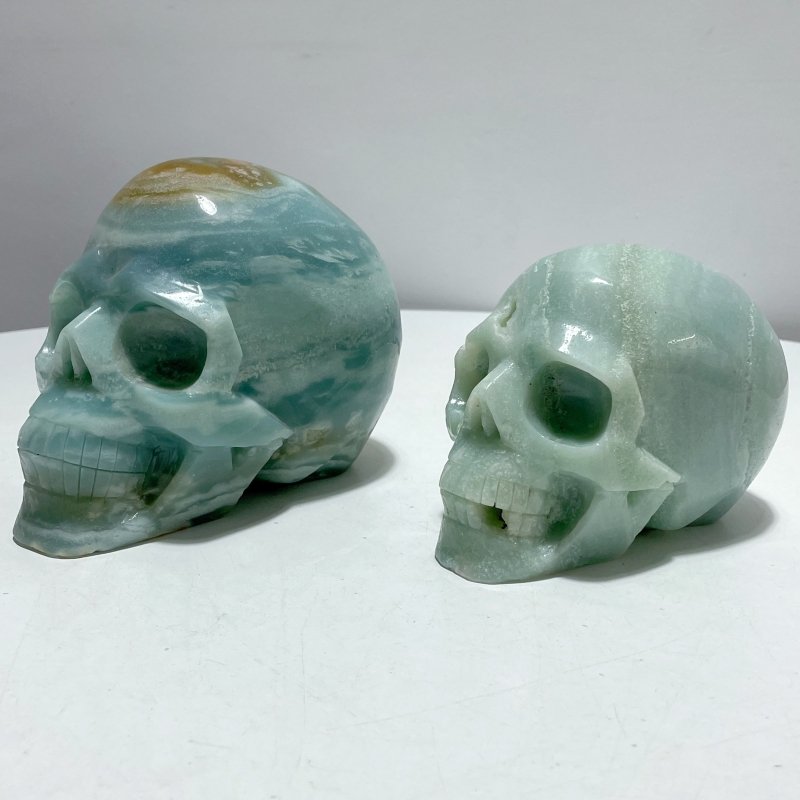 2 Pieces Large Caribbean Calcite Skull Carving - Wholesale Crystals