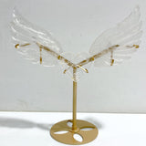 Clear Quartz Heart Wing Carving With Stand