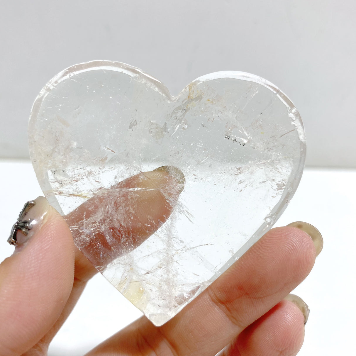 Clear Quartz Heart Wing Carving With Stand
