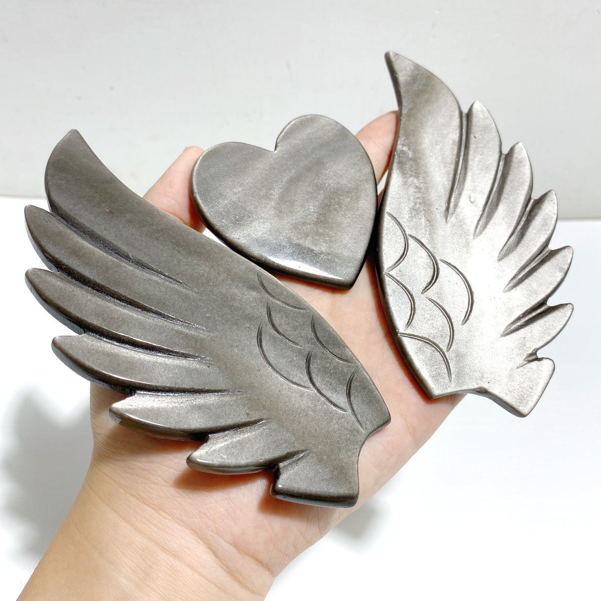 Silver Sheen Obsidian Heart Wing Carving With Stand