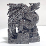 7.1in Unique Yooperlite Flying Dragon With Castle Carving (UV - Reactive) - Wholesale Crystals