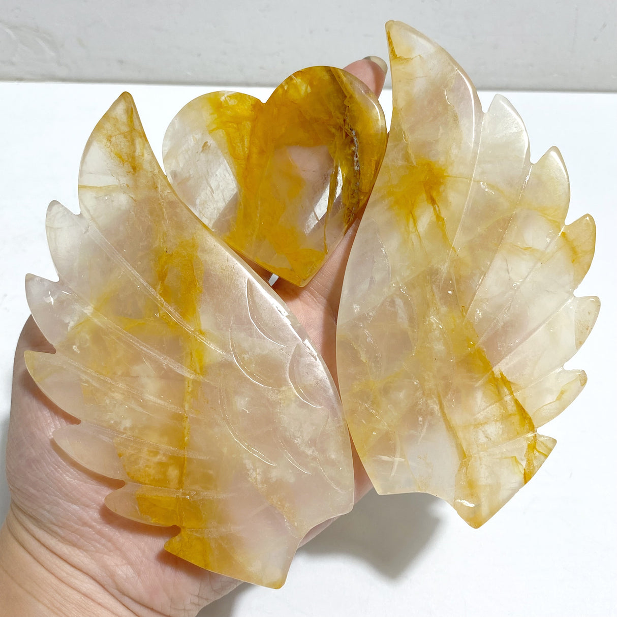 Golden Hematoid Quartz Heart Wing Carving With Stand Fire Quartz