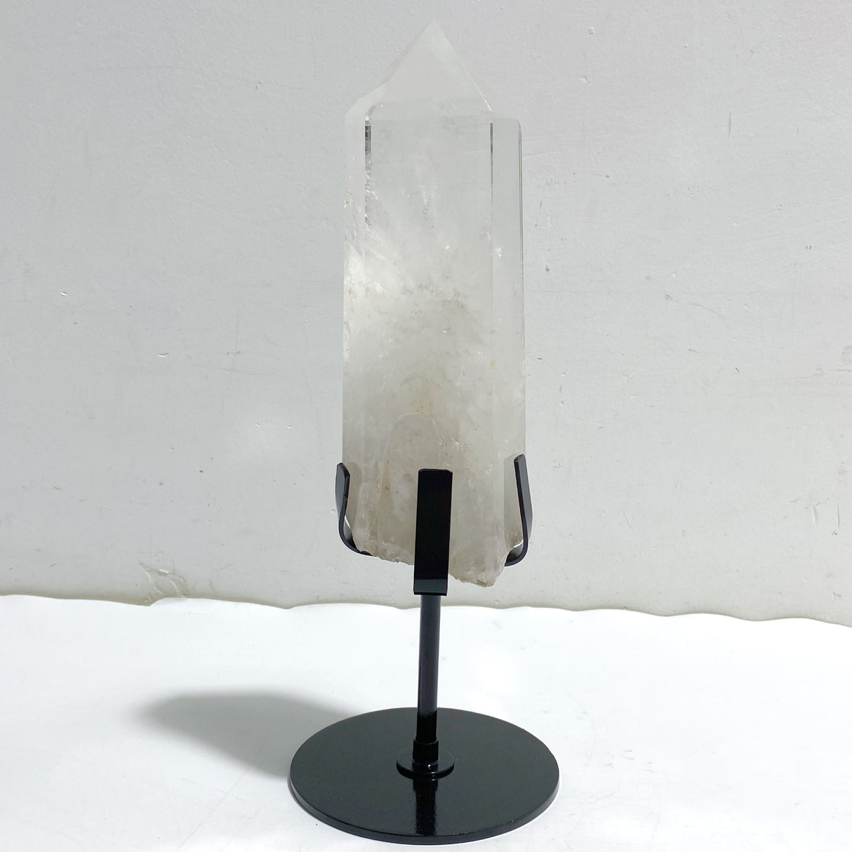 Large Clear Quartz Point Raw Bottom With Stand