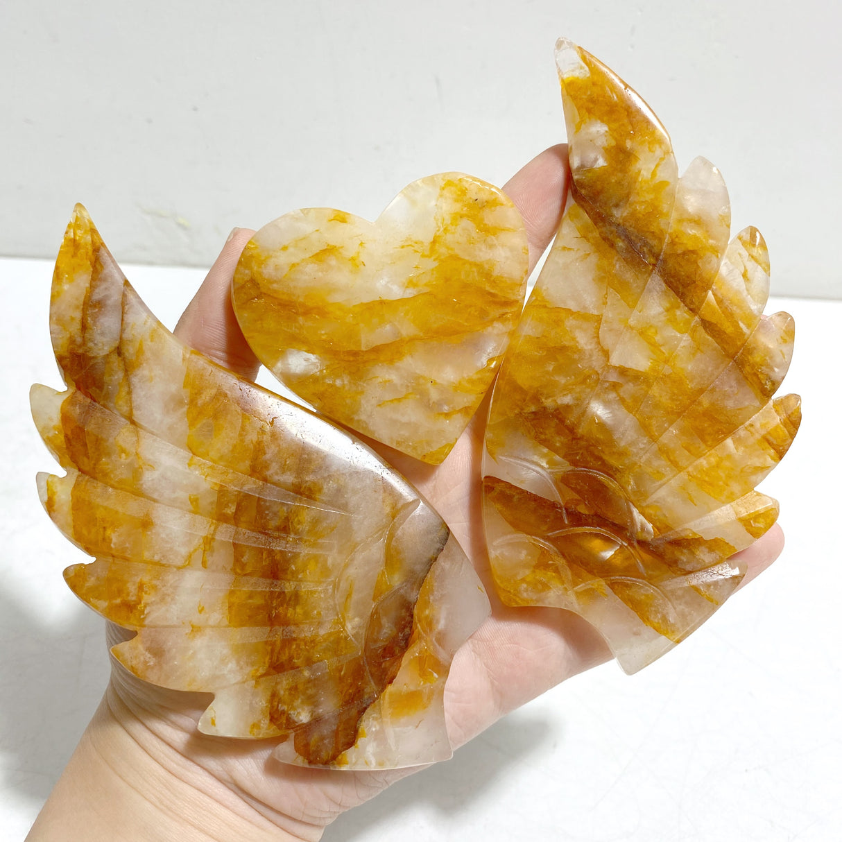 Golden Hematoid Quartz Fire Quartz Heart Wing Carving With Stand