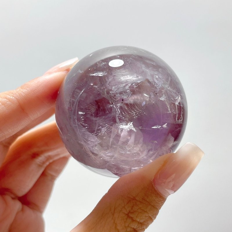 God's Fingerprint Amethyst Light Purple Spheres Wholesale - Wholesale Crystals