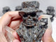 Yooperlite Skeleton In Top Hat Carving Wholesale (UV Reactive)