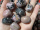Pink Black Rhodonite Tumbled Wholesale -Wholesale Crystals