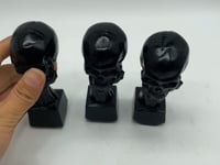 Black Obsidian Hand Holding Skull Carving Wholesale -Wholesale Crystals