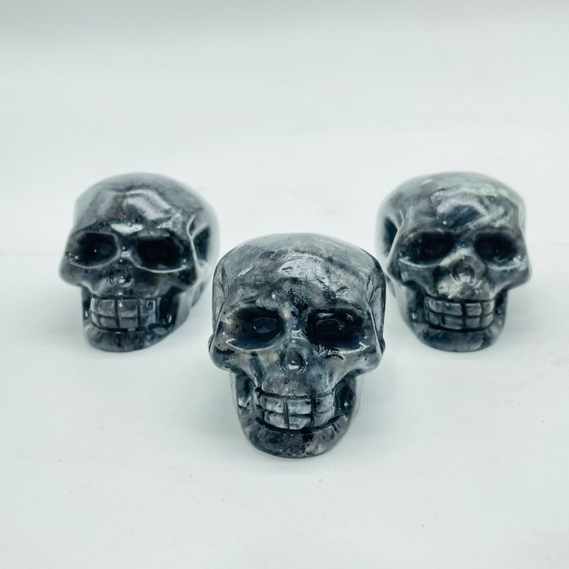 1.7in Skull Carving Wholesale Yooperlite (UV Reactive) Larvikite - Wholesale Crystals